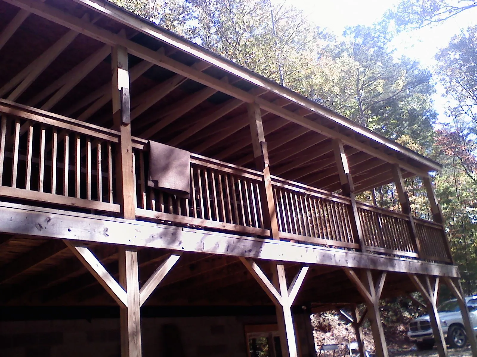 Timber framing under a new elevated porch and deck — Roof Leak Repair in Gilsum by Roofing Brothers
